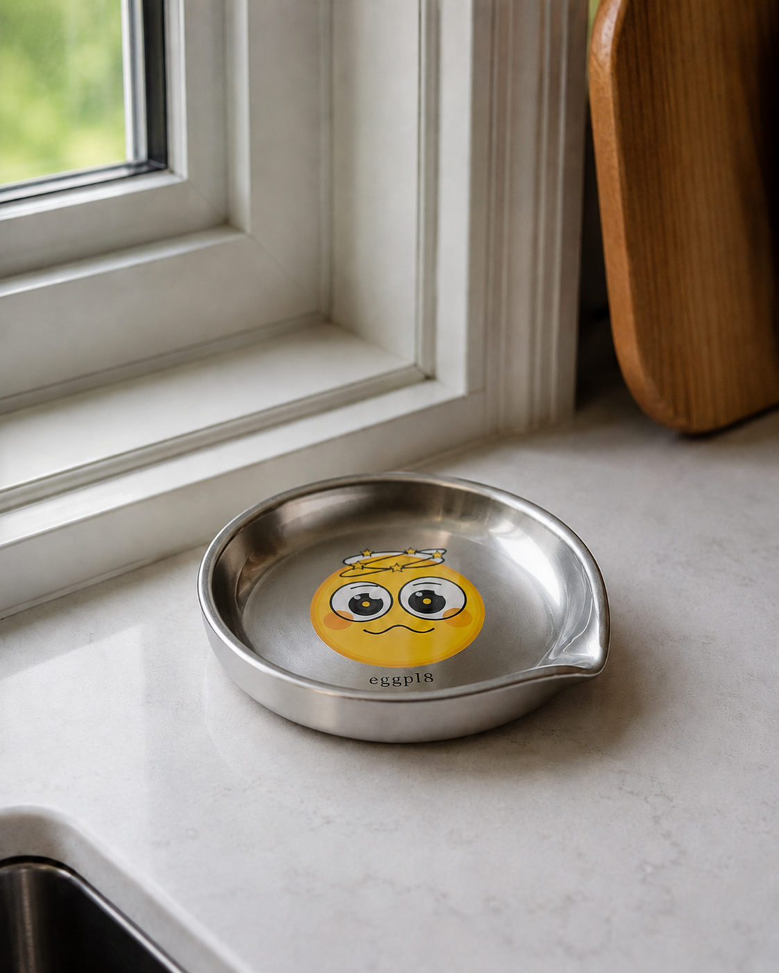 eggpl8 stainless steel on a window sill